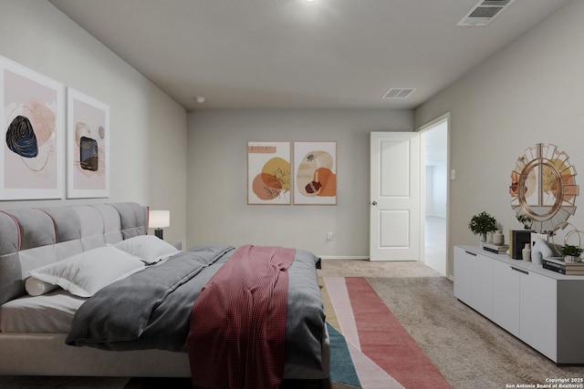 bedroom featuring light colored carpet