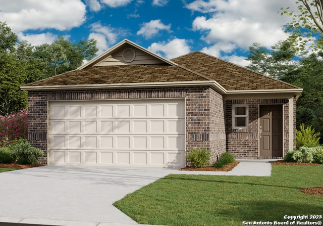 view of front facade featuring a front yard and a garage