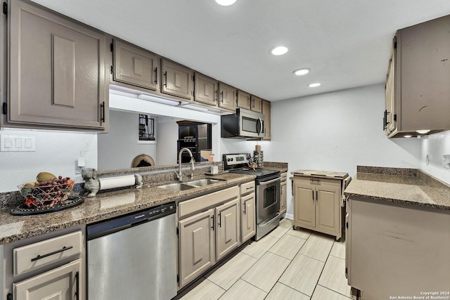 kitchen featuring stainless steel appliances and sink