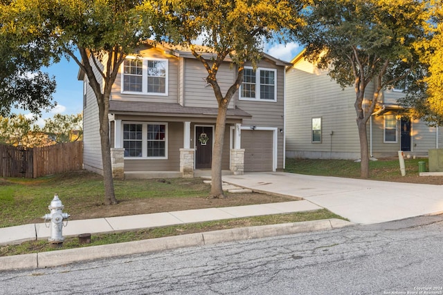 view of front of property featuring a garage