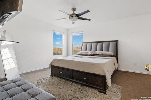 carpeted bedroom featuring ceiling fan