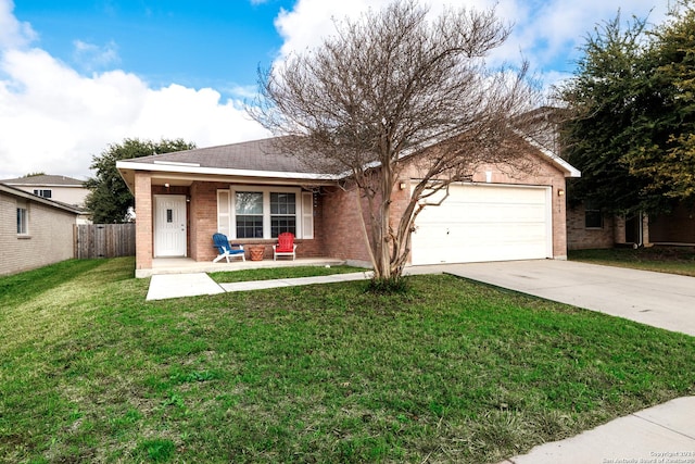 ranch-style house with a garage and a front lawn