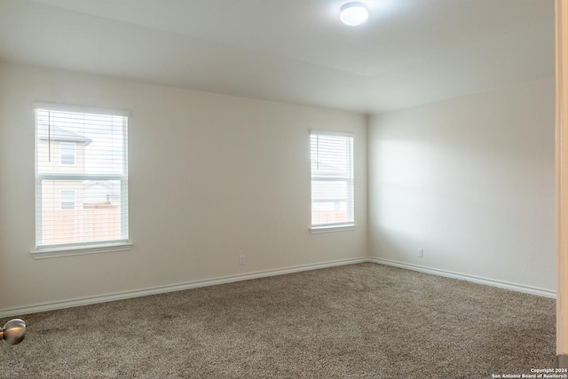 view of carpeted spare room