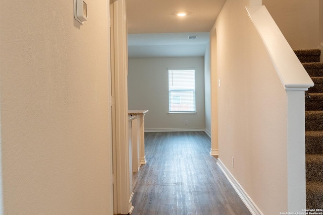 hall featuring wood-type flooring