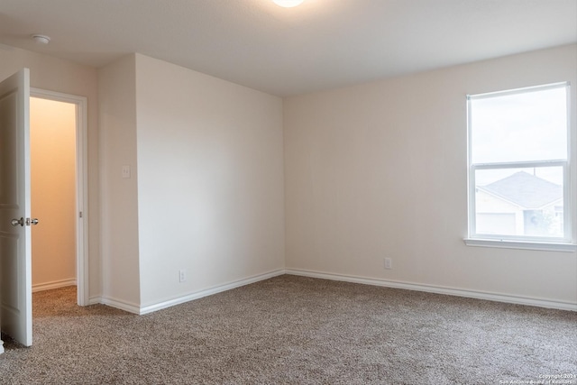 view of carpeted spare room