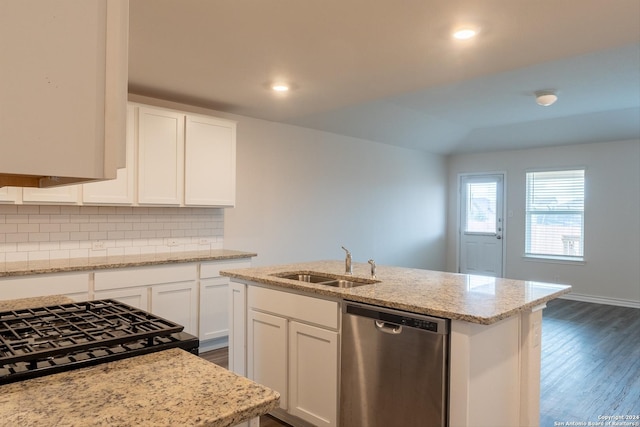 kitchen with white cabinetry, sink, an island with sink, and stainless steel dishwasher