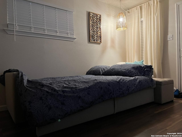 bedroom featuring hardwood / wood-style floors