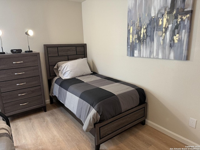 bedroom featuring light hardwood / wood-style flooring