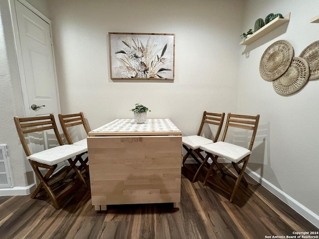 sitting room with dark hardwood / wood-style floors