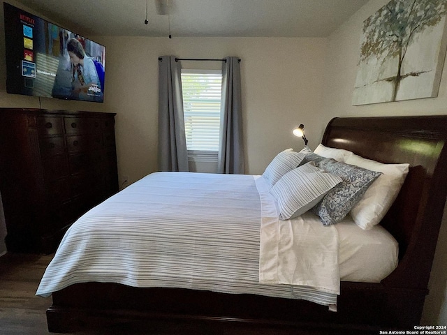 bedroom featuring hardwood / wood-style flooring