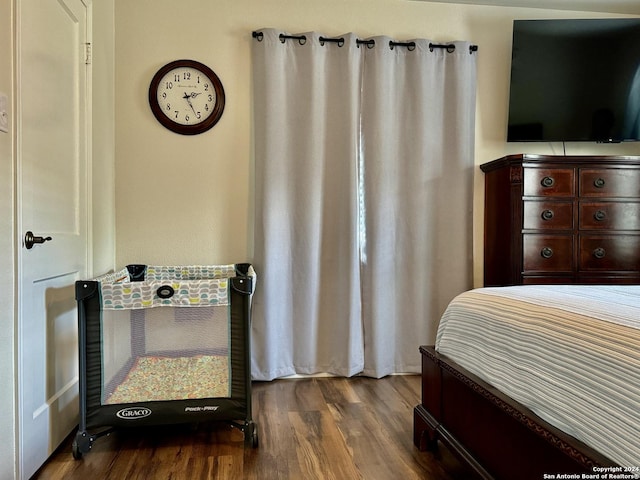 bedroom featuring hardwood / wood-style floors