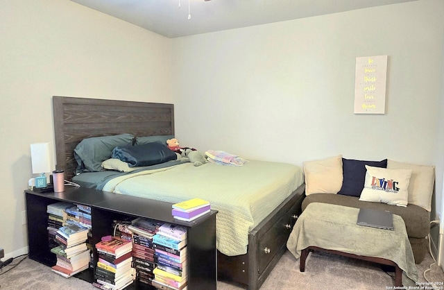 bedroom featuring carpet