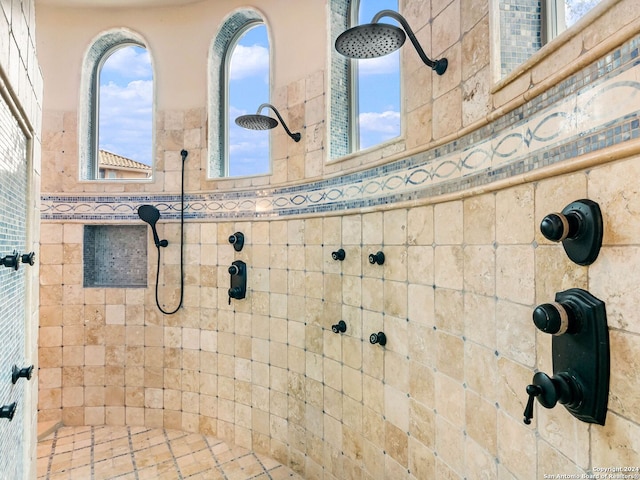 bathroom featuring tiled shower