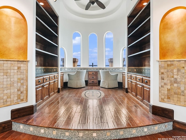 interior space featuring hardwood / wood-style floors and ceiling fan