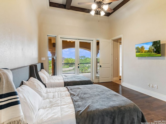 bedroom featuring access to exterior, ceiling fan, dark wood-type flooring, beamed ceiling, and a towering ceiling