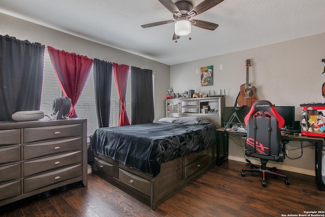 bedroom featuring a textured ceiling, ceiling fan, and dark wood-type flooring