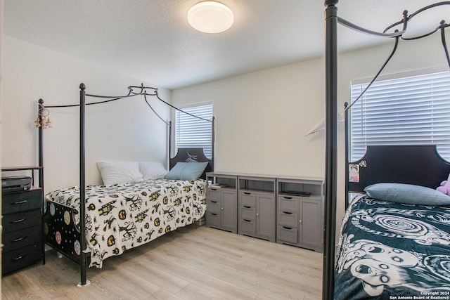 bedroom featuring light hardwood / wood-style floors