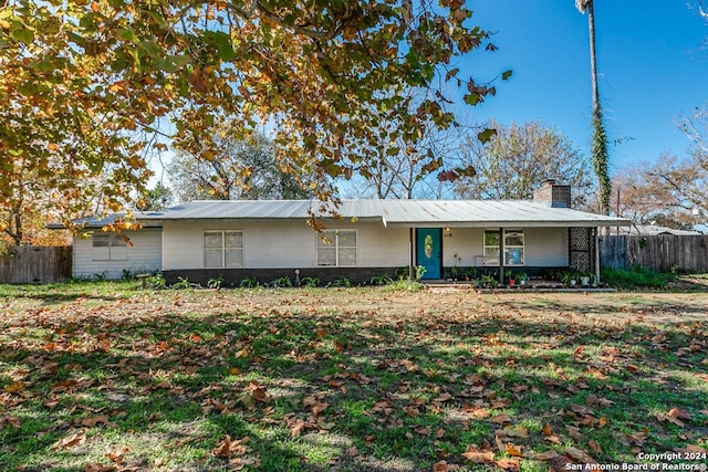 ranch-style house featuring covered porch