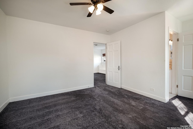 carpeted empty room with ceiling fan