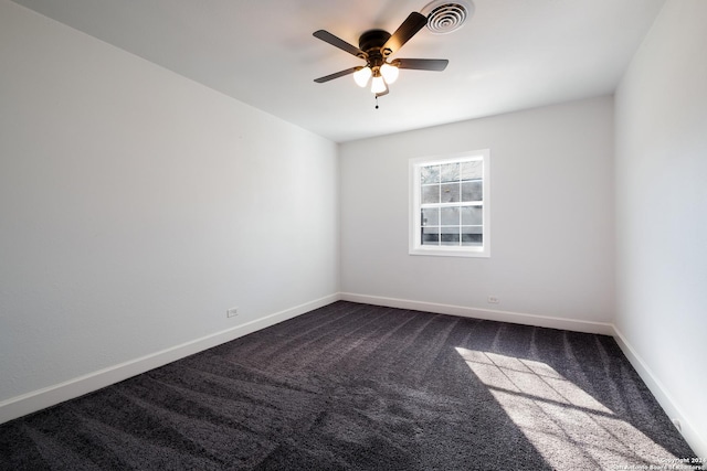 empty room with carpet flooring and ceiling fan