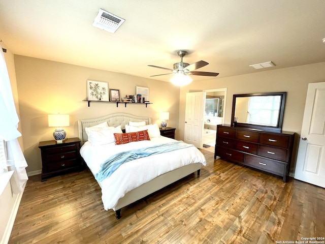 bedroom featuring connected bathroom, ceiling fan, and wood-type flooring