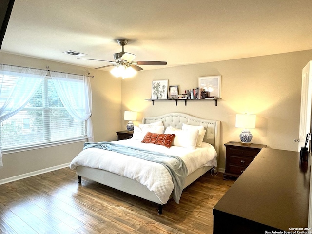 bedroom featuring hardwood / wood-style flooring and ceiling fan