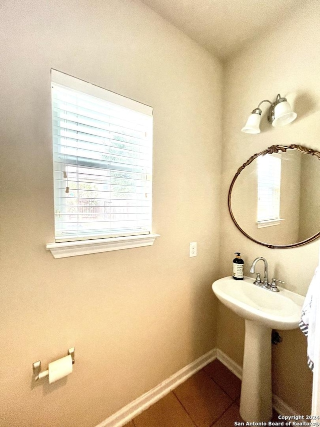 bathroom with tile patterned flooring