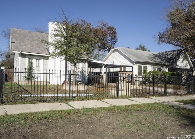 view of front facade with a carport