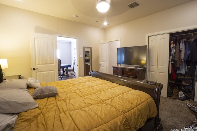 bedroom featuring ceiling fan and a closet