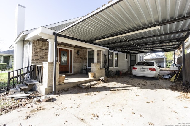 exterior space with a carport