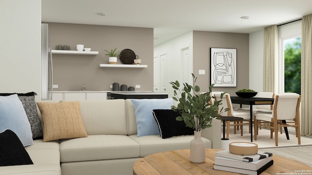 living room with sink and hardwood / wood-style flooring