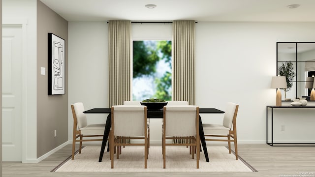 dining space featuring light hardwood / wood-style floors