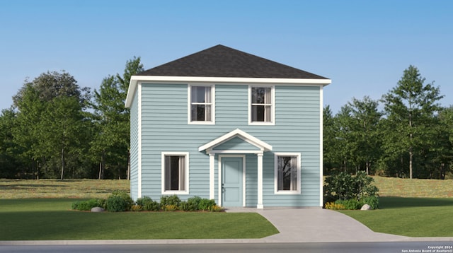 view of front of property with a front lawn