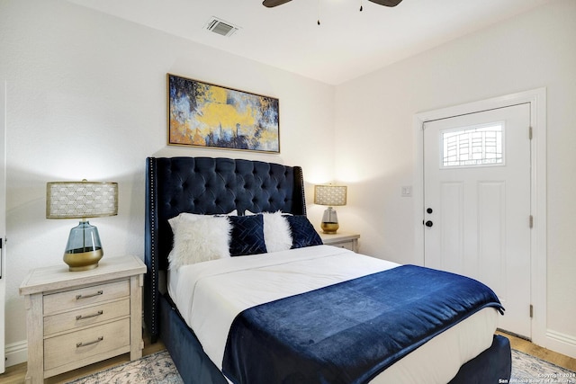 bedroom featuring ceiling fan and light hardwood / wood-style floors