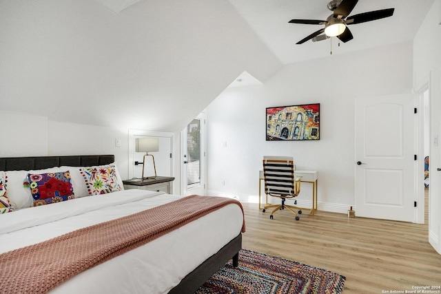 bedroom featuring light wood-type flooring, ceiling fan, and lofted ceiling