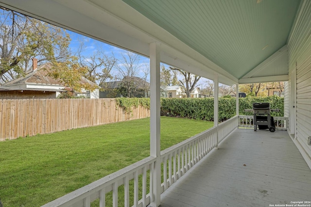 deck with a yard and a grill