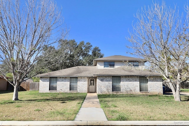 view of front of home with a front lawn