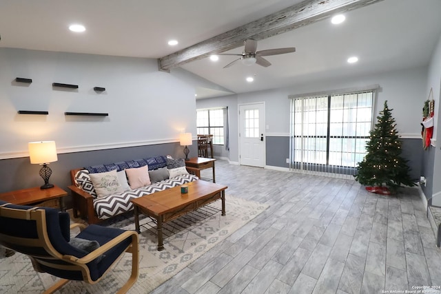 living room featuring vaulted ceiling with beams, ceiling fan, and light hardwood / wood-style floors