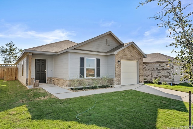 view of front of house with a front lawn and a garage