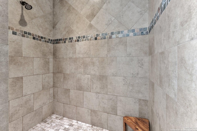 room details with a tile shower