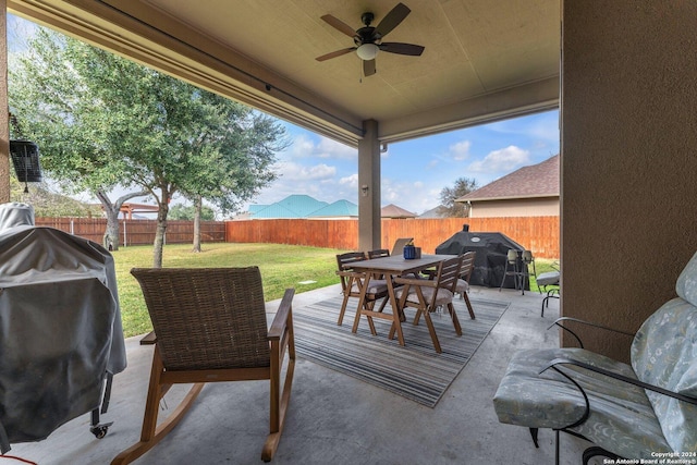 view of patio featuring ceiling fan and grilling area