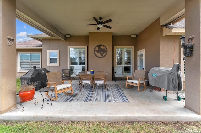 view of patio / terrace with a grill and ceiling fan