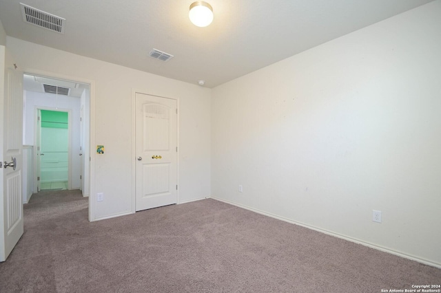 spare room with carpet floors