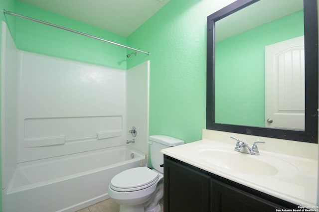 full bathroom featuring vanity, toilet, and  shower combination