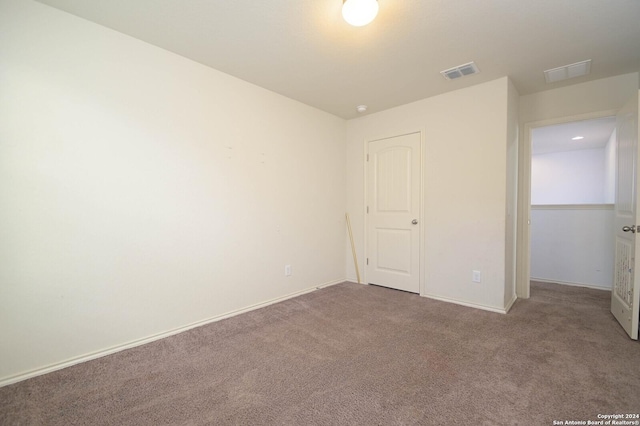 unfurnished bedroom featuring carpet flooring