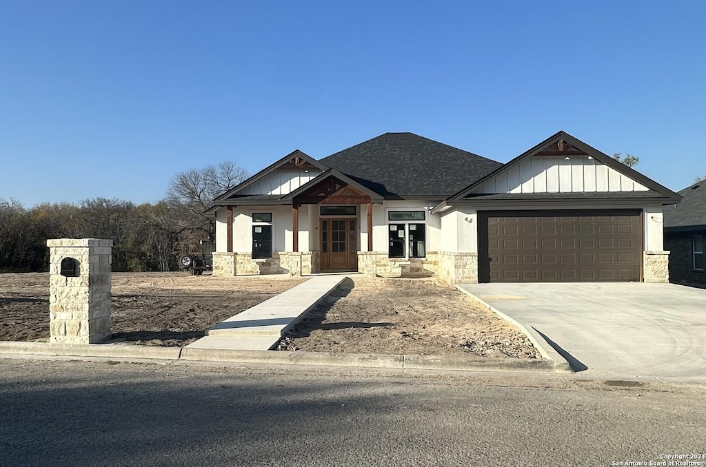 view of front of property with a garage