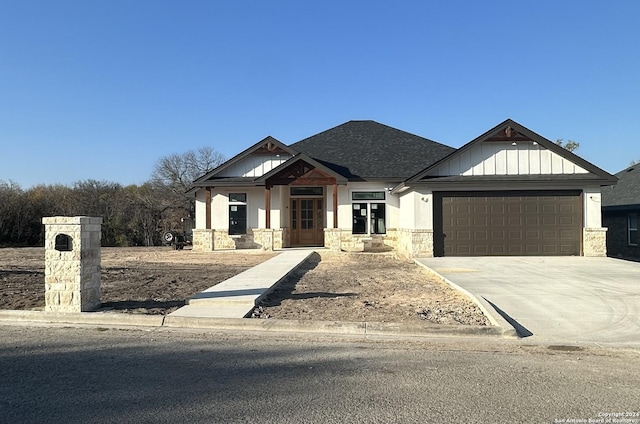 view of front of property with a garage