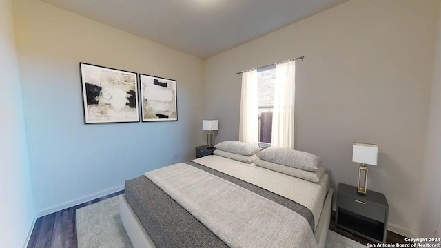 bedroom featuring hardwood / wood-style flooring