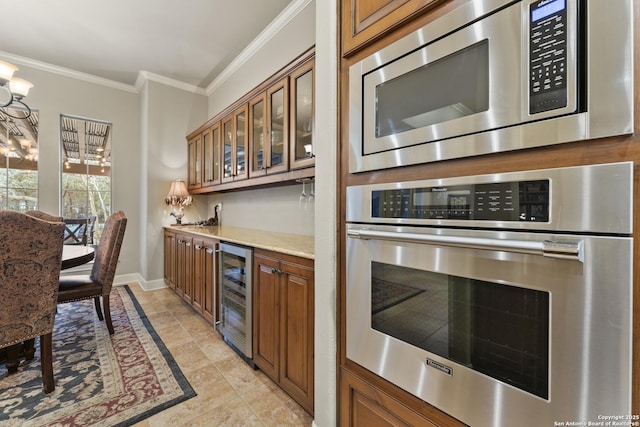 kitchen with crown molding, light tile patterned floors, light stone countertops, stainless steel appliances, and beverage cooler