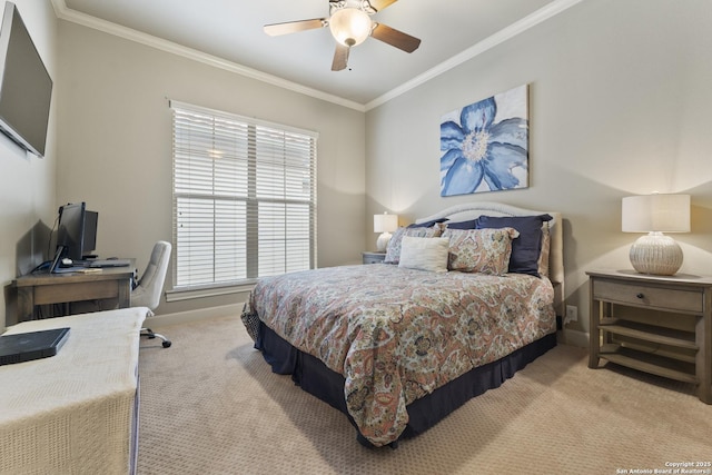 bedroom featuring ceiling fan, crown molding, and light colored carpet